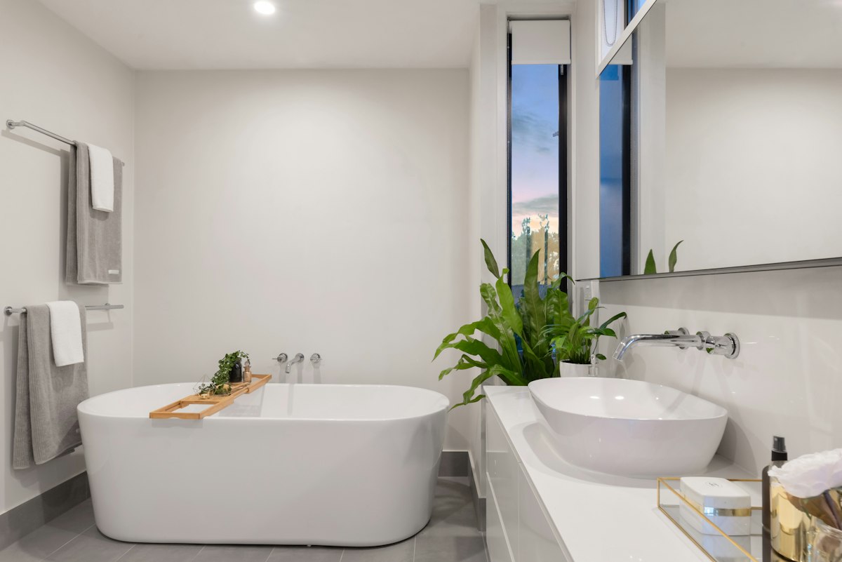 Illustrative contemporary bathroom suite with tiling — renovation context